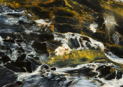 Sweeping patterns of black, white and yellow form a riverlike scene