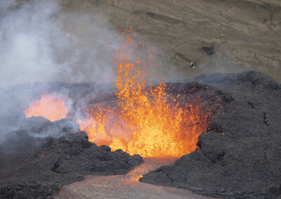 Lava erupts from a caldera in Iceland