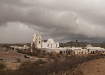 The Mission San Xavier del Bac in Arizona with threatening storm clouds