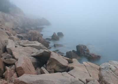 A foggy shot of craggy rocks at Mount Desert Island in Maine