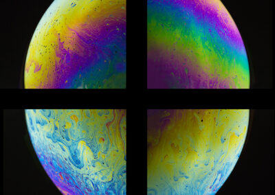 Four-part reflective artwork formed from iridescent bubbles