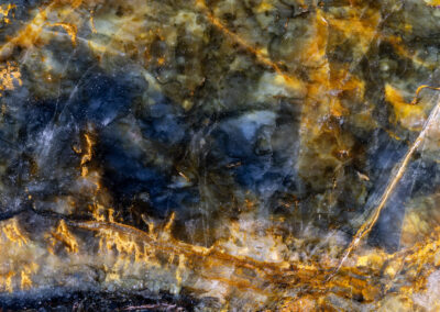 Cracks, clouds and a riverlike vein in a mineral