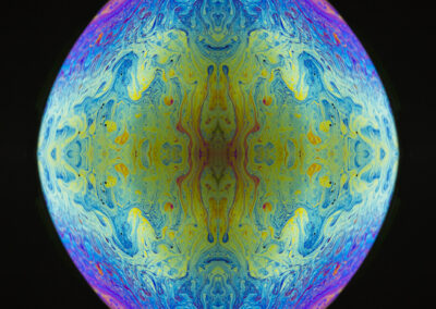 Reflective artwork formed from an iridescent bubble