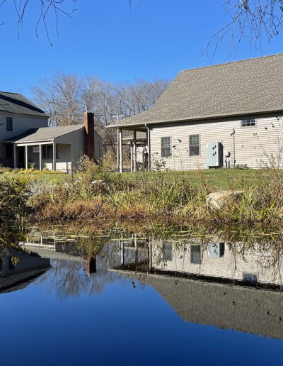 Exterior shot of a converted house and an outbuilding