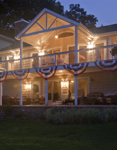 A night shot of a lakeside house