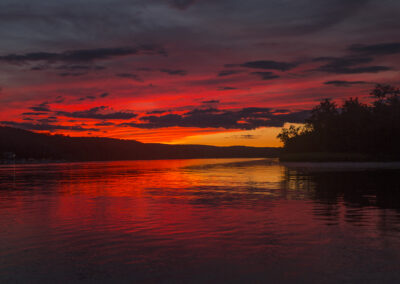 A deep red sunset over the Connecticut River