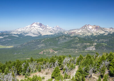 Landscape photo of the Cascade Mountains overlooking an Oregon valley