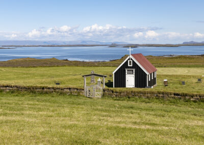 Bjarnarhofn black church on the coastline in Iceland