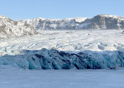 Icelandic glacier with snowy hills
