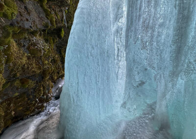 A frozen Kirkjufellsfoss waterfall in Iceland