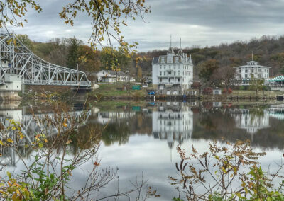 A view of the Swing Bridge, Goodspeed Opera House and Gelston House with the Connecticut River in the foreground