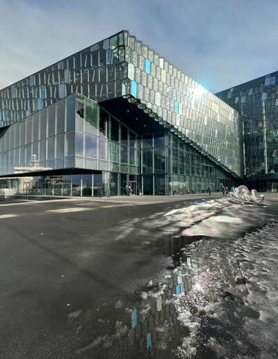 An exterior shot of the Harpa concert hall in Iceland