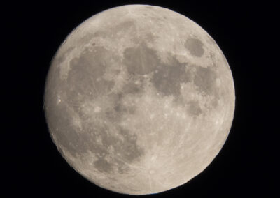 A detailed shot of the full moon in the Connecticut sky