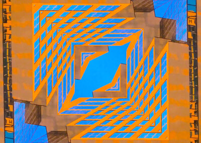Photo composition of an urban tower tinted blue and orange and formed into a quiltlike pattern