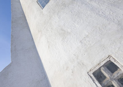 The stuccoed walls of the Malarrif Lighthouse in Iceland