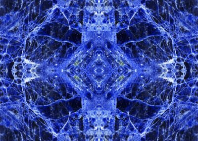 A reflected mineral creates a royal blue orblike pattern
