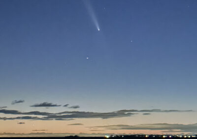A comet in the sunset sky at the Connecticut shoreline