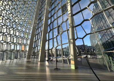 Interplay of light in the glass walls of the Harpa Concert Hall