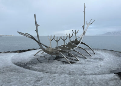 Icelandic seascape with metal boat sculpture