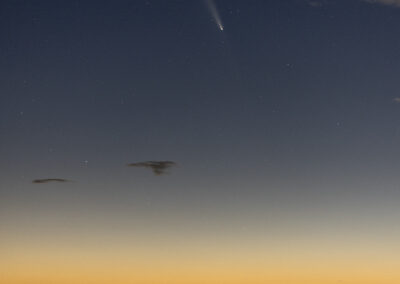 A comet in the sunset sky at the Connecticut shoreline