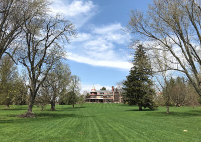 Photo of Sonnenberg Mansion in New York with large lawn
