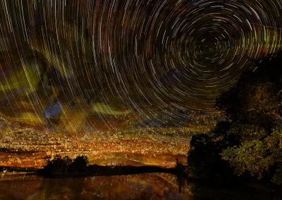 Photo composition of starfield with crystalline mineral