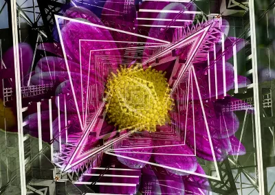 A strange metallic structure reveals an opening flower in its center