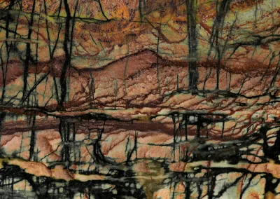 A landscape-like mineral composition in pale greens and maroon